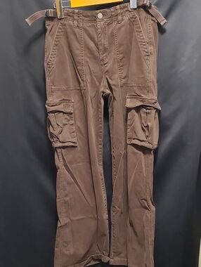 SANCTUARY  relaxed cargo pants, featuring side buckle adjustments at the waist.